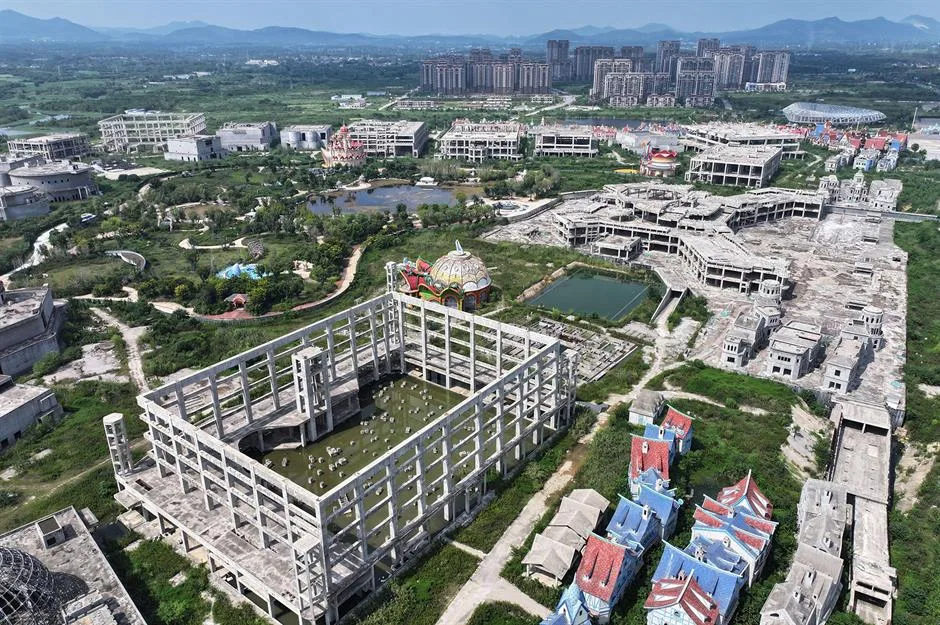 China's struggling property market, exemplified by vast unfinished developments and 'ghost cities,' 